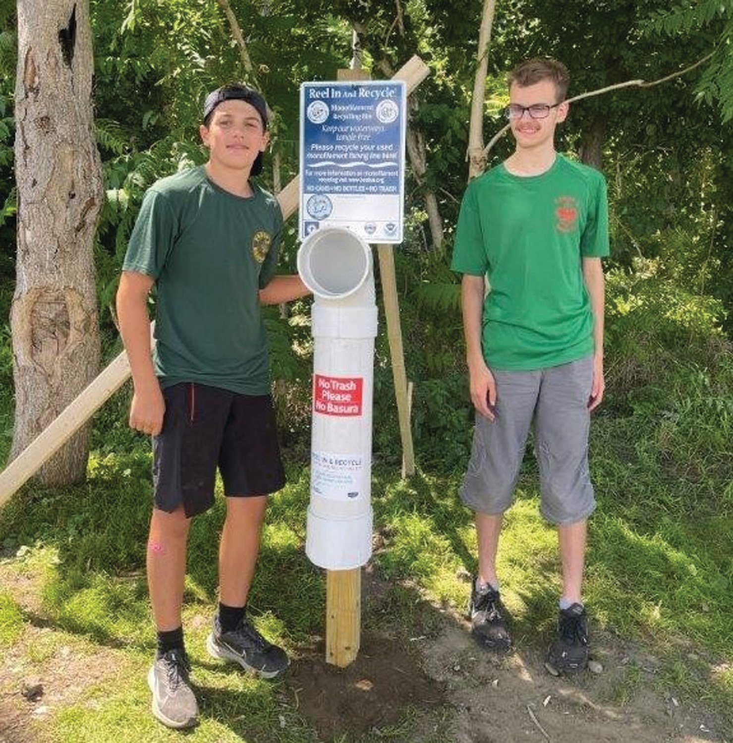 EAGLE SCOUT: Nathan Simas of Bristol with friend Nathan Dieterich. Simas built five fishing line receptacles as part of his Eagle Scout journey.